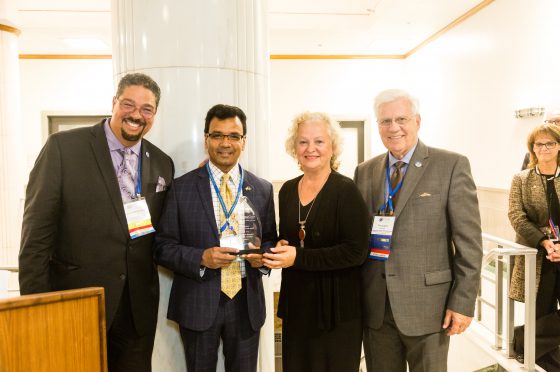 Roger-Mark De Souza and Tim Quigley with Global Leaders Circle Members